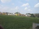 A view of Sri.Laxmivenkateshwara Temple from the NH #7 over a neglected weed grown Lake once a eye pleasing sight.