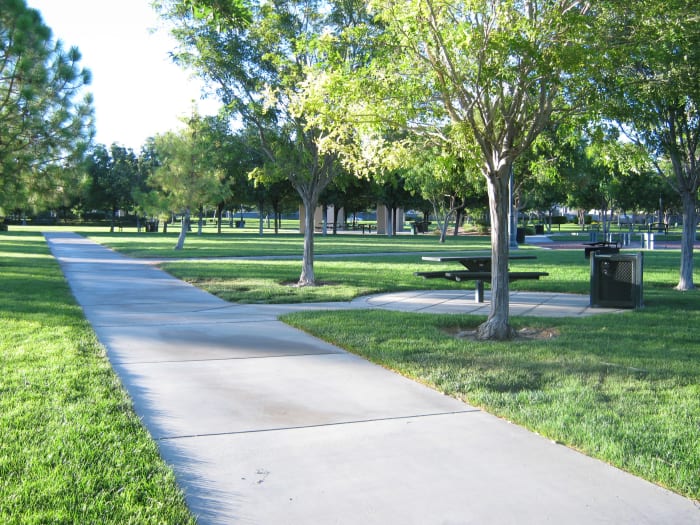 A beautiful place for a walk. We see a lot of dog walkers here in the evening! Lining the path are little doggie boxes where you can get brown bags to pick up after Fifi or Brutus. Very thoughtfully designed park!