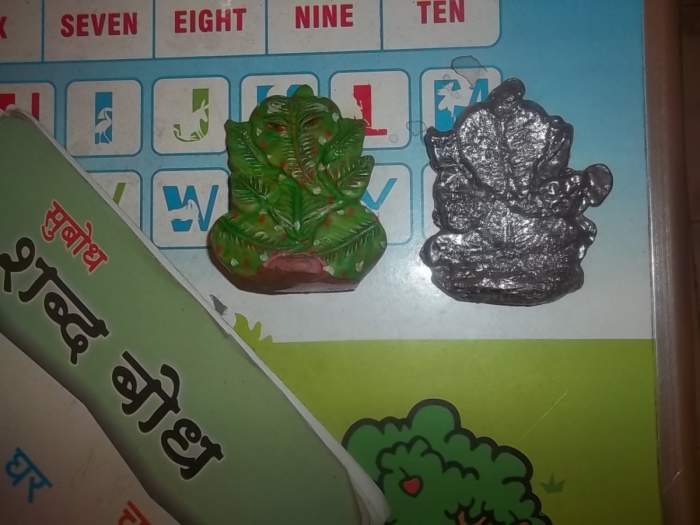 The green Ganesha in the left is what I used in the mold and the right one is the final output I produced of the waste lead pieces