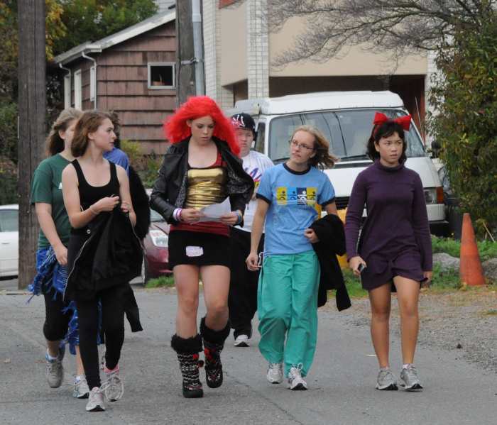 These Seattle teens are mostly appropriately dressed...minus the mini-skirt in the middle. Plus, most of these costumes look home-made and therefore will save $$.