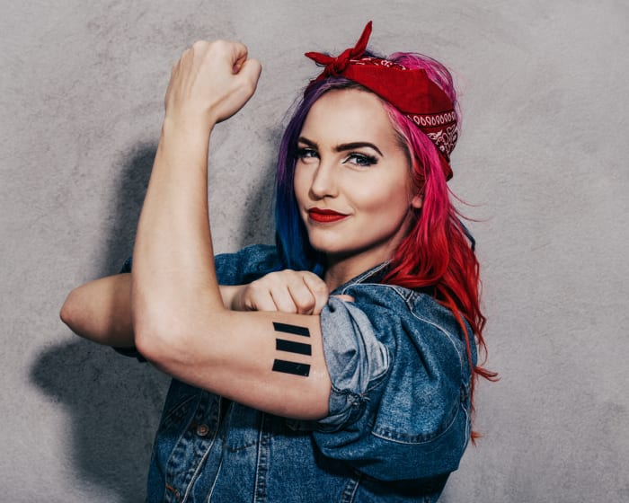 Rosie the Riveter hairstyle is so easy to do...you pretty much tie a bandana around your hair and whalla!