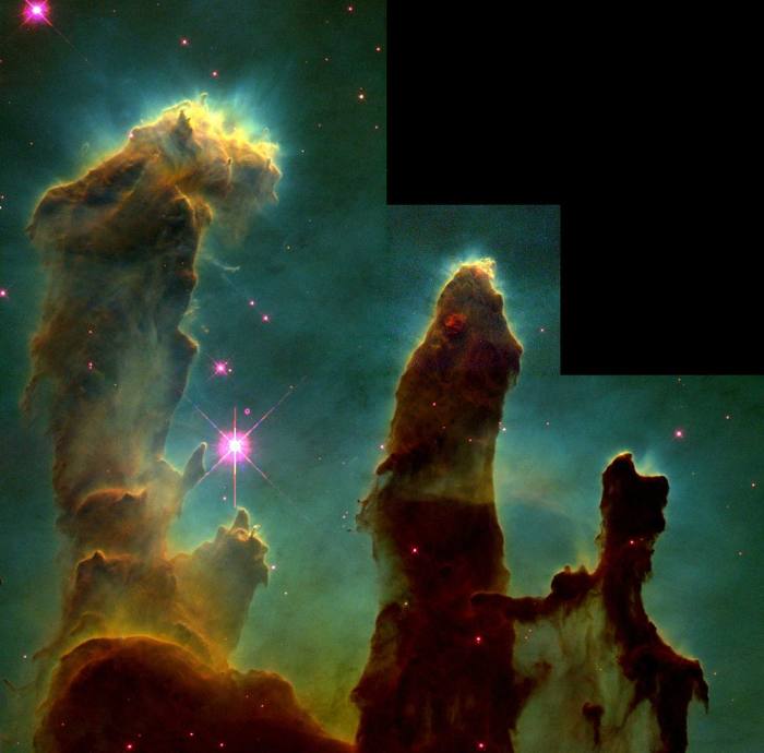 The Pillars of Creation, elephant-looking trunks of interstellar gas and dust, are part of the Eagle Nebula.