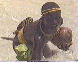 This woman collected coconuts handed out by Indian government delegation during an attempted friendly contact in the early 1990's.