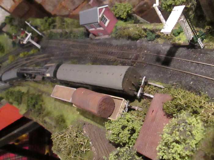 Above the cattle creep, the engineer's train rests in the siding next to the 'cripples' road. See the old boiler on the nearside wagon? (No, not the mother-in-law!)