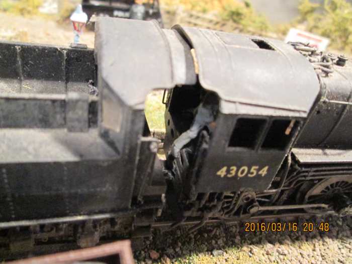 Different perspective: a look down onto 43054's footplate with the fireman hard at work shovelling coal onto her grate