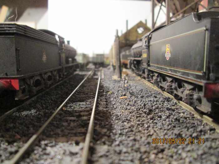Looking along the roads. Now 62064 has moved over to one of the shed roads her driver can carry on chatting until the shed foreman sends him on his way. Business is brisk in the mid-1950s for steam drivers in the North East