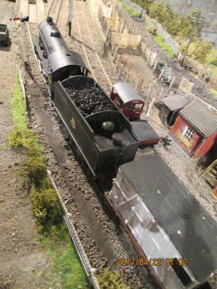 K1 62064 takes a 'down' branch perishables (refrigerated foodstuffs) freight past Thoraldby Gates signal cabin