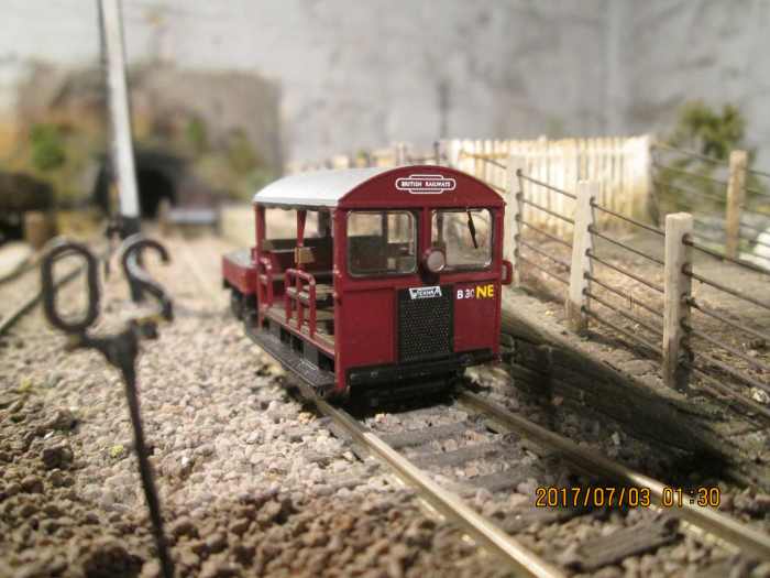 That Wickham Gangers' trolley has undergone a small identity change, the regional 'W' replaced by 'NE'; parked on the livestock dock/machine ramp road by the signal cabin - just needs a driver