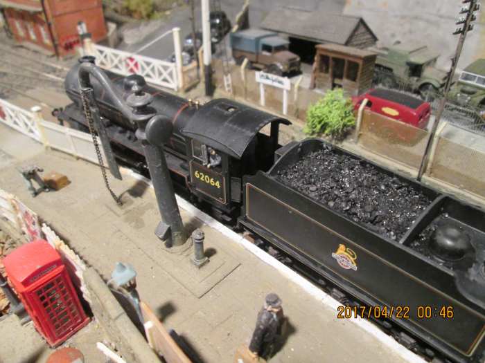 Bird's eye view of 62064 beside the water crane. The following train will be a local (stopping) passenger working