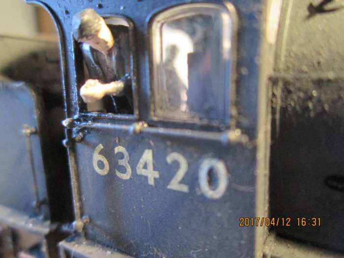Here's the other driver in close-up, painted and leaning out of his cab during a signal check to see who's on the engine coming the other way
