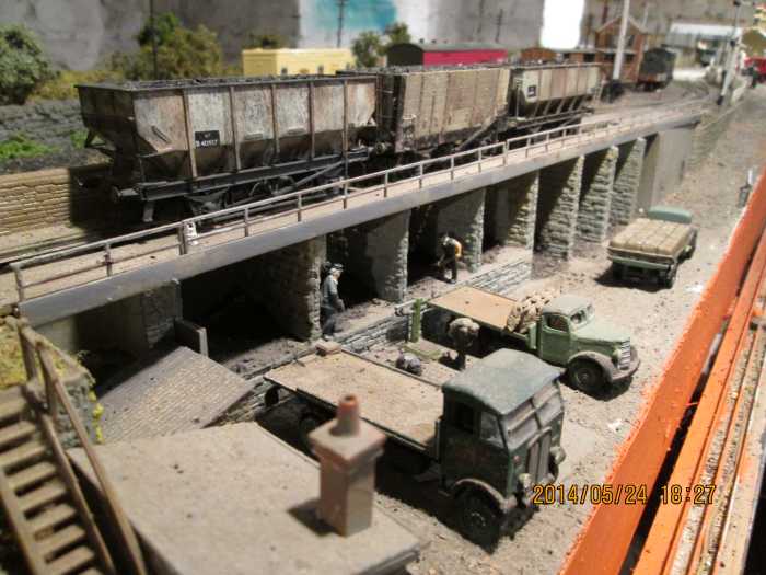 Looking over the depot with lorries being loaded, hoppers on the 'gantry' staith (too many modellers call them 'staithes' - that's the name of a fishing village on the Yorkshire coast where James Cook started his sea-going career)