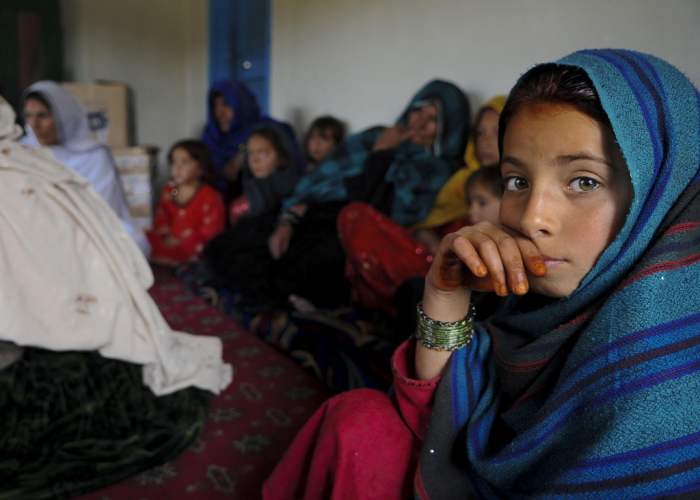 An Afghan girl attends a female engagement team meeting in Balish Kalay Village, Urgun District, Afghanistan. Women and children attended the meeting with the FET of Paktika Provincial Reconstruction Team to discuss major issues and concerns.