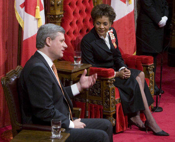 Governor General Michaelle Jean and Prime Minister Stephen harper chat prior to the reading of the Throne Speech in the Senate Chamber on Parliament Hill in Ottawa Wednesday Nov 19, 2008