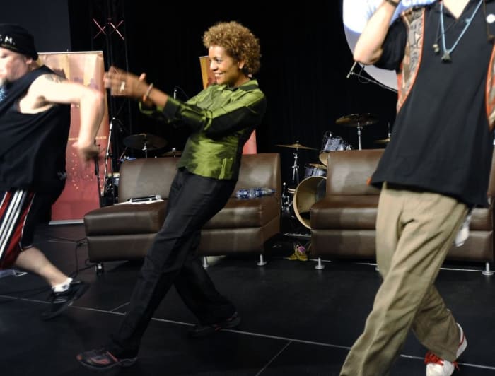 Governor General Michalle Jean getting hip-hop dance lessons while visiting NAIT in Edmonton to talk with youth about peace and hip-hop to overcome barriers and violence in society, Aug 2009