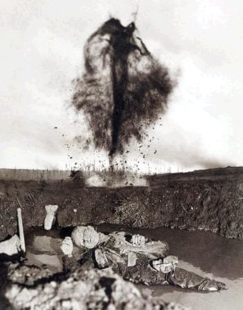 'Taken' by Frank Hurley WW1 freelance photographer, who had the courage to shock and was determined to do so! Of course when you can overlay negatives, then you can shock the public into looking beyond what the politicians say!