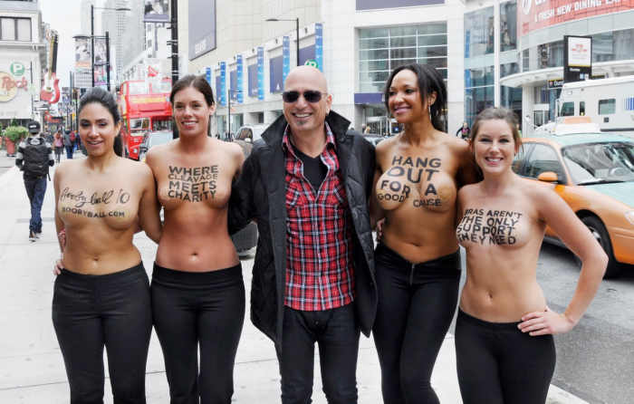 Howie Mandel while shopping downtown Toronto posed with the Rethink Breast Cancer ladies promoting BoobyBall 10
