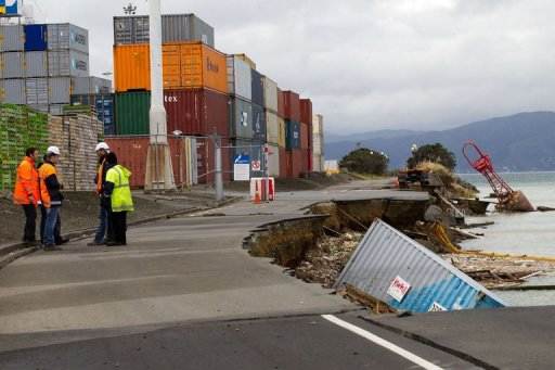 An empty shipping container sits in the harbour where the land fell into the sea, on July 22, 2013 (AFP, Marty Melville)