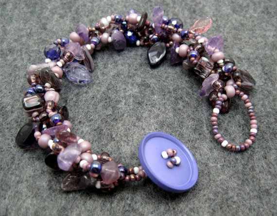 This is one of my pieces from my rock garden series. In addition to seed beads, I frequently use gemstone chips and rounds and Czech glass shaped beads in these pieces.