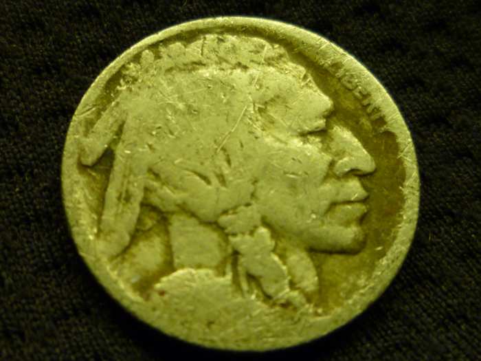 Date-less Nickel. This could have been a Key Date, but excessive wear has left this Nickel virtually worthless.