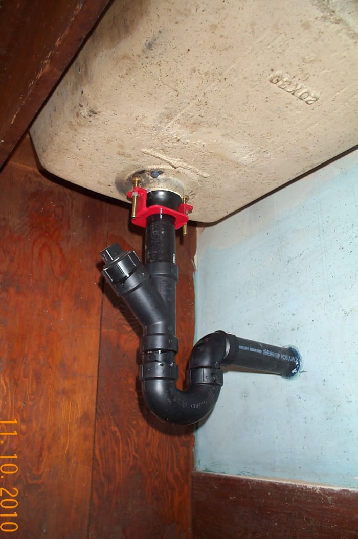 This sink was desgned to be used with lead pipe plumbing. Hardly a health-conscious option, but who knew then? We made it work with modern pipe.