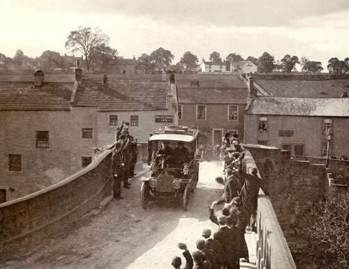 Pre-WWI view of a car entering Barnard Castle over the County Bridge (former boundary with the North Riding until 1974) from the village of Startforth - see comments box below