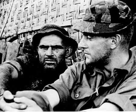 MAJ Charlie Beckwith, at left, CO Detachment B-57, 5th Special Forces Group, during October 1965 siege of Plei Me Camp.