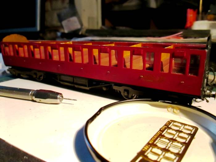 Work underway on a Thompson 8 compartment non-corridor coach - Comet 'tumblehome' sides with Ian Kirk plastic seating and painted compartment walls. Underframe and door-handle detailing from MJT - awaiting grab rails at door sides.