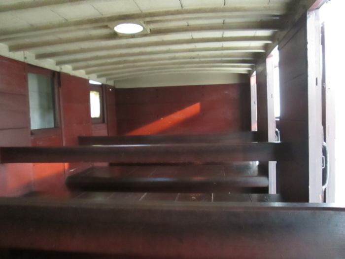 Hows's this for basic? Communality in capital letters.Lighting through windows, and ventilation in the roof - see the hole, topped by a cylindrical cowl. And below...