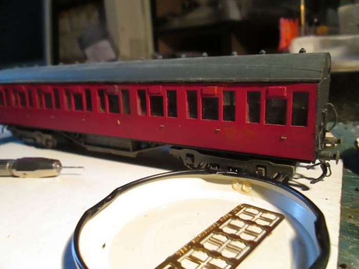 The roof has been temporarily set in place to show the appearance - MJT LNER-type torpedo vents fixed in place before re-numbering (MJT door handle and grab rail etched fret in foreground)