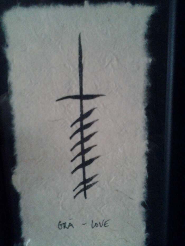 This is called an Ogham Wish,. It's a series of 'words' written in the first Irish alphabet. The word and symbol for Love in Celtic was gra'. This Ogham Wish is handmade by a woman in Ireland.