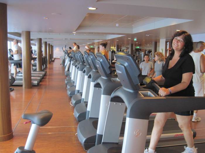 Working out in the Norwegian Epic's workout center to burn off some of the calories from all the good cruise food!