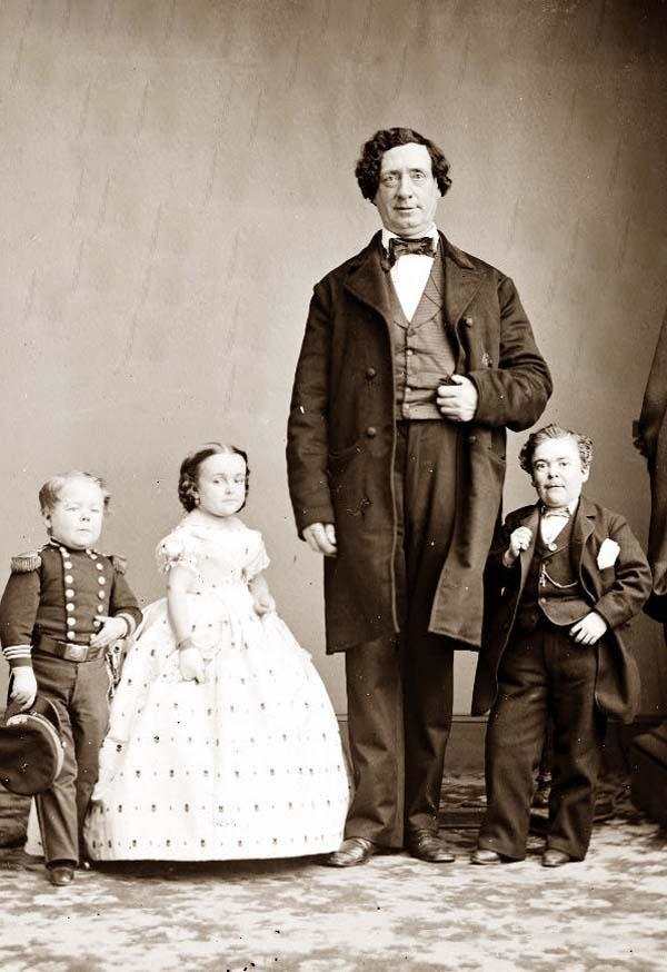 Gen. Tom Thumb (Charles Stratton) and Lavinia Warren on their wedding day with Commodore Nutt and the Giant.