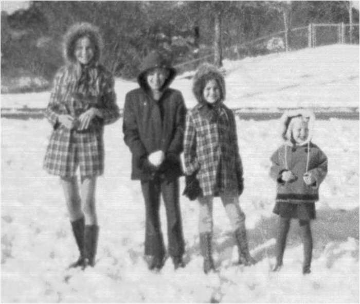 My siblings and I on a freak snow day in the South. I am the oldest one to the far left. Look at the mini skirt I am wearing. Ha ha.