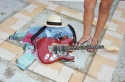 Guitar, clothes and legs | Initial logo for Jamaica Blues Jam | Taken at Hedonism Resort Jam in Jamaica