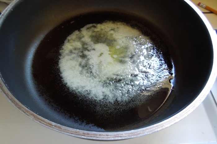 I sprayed pan with Pam before heating oil. Oil is ready for you to put steaks in pan when it looks like this, all bubbly.