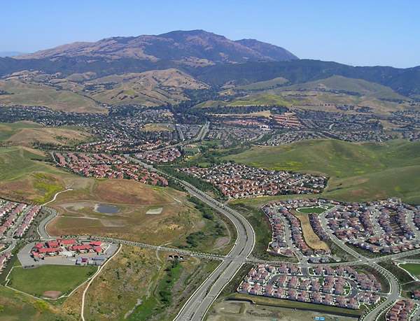 Urban sprawl typically looks like this where hundreds or thousands of homes are built in one location. Every one of these homes is managed on credit from the bank where a default can mean foreclosure.