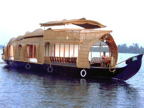 Then there are houseboats that take on all manner of forms around the world. Many of these are made by the person living in them. In this case, this is a small floating hotel in India catering to tourism.