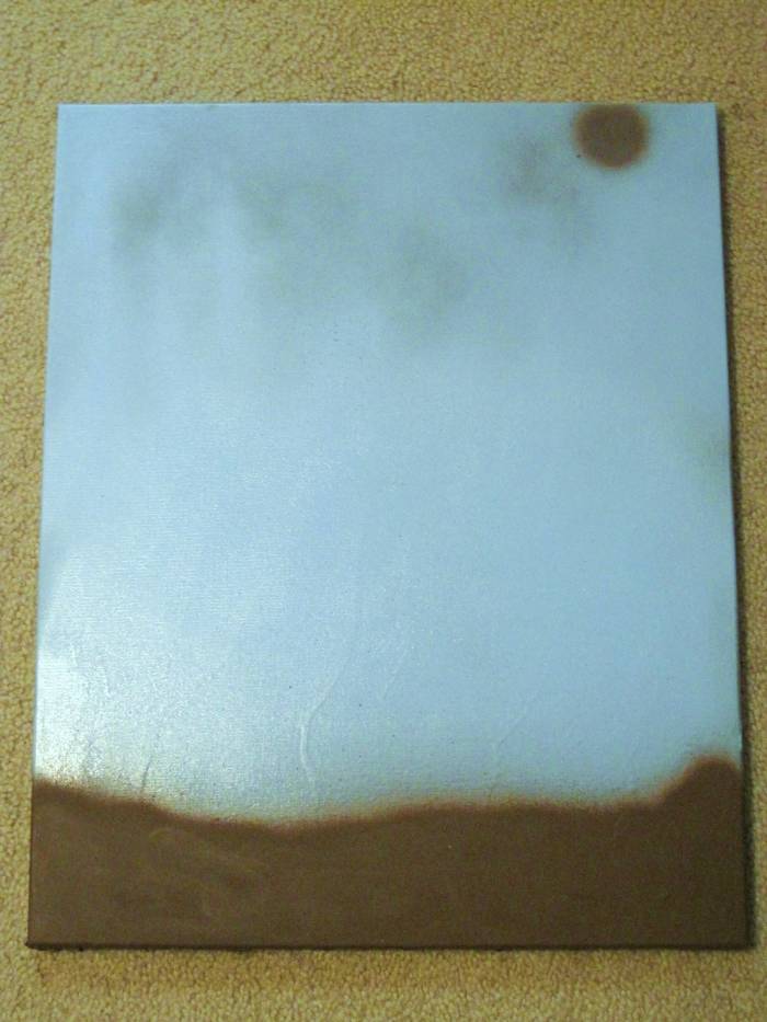 If you don't want an all white canvas, spray paint is an easy way to create an abstract background.
