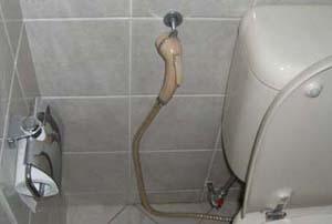 After a bowel movement, use the toilet hose or bum gun to shoot a pressurized stream of water up your anus for cleaning.