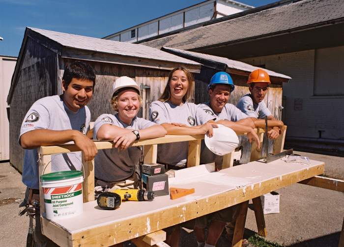 Teens volunteering...maybe this was on their bucket list?
