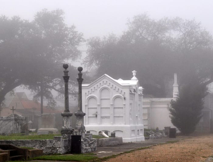 These in Masonic Cemetery in the fog- all graves here are owned by Masons, many of which are buried by "Lodge." The coping style grave in front is the Hiram Lodge 70, the large white tomb is Alpha Home Lodge 72.