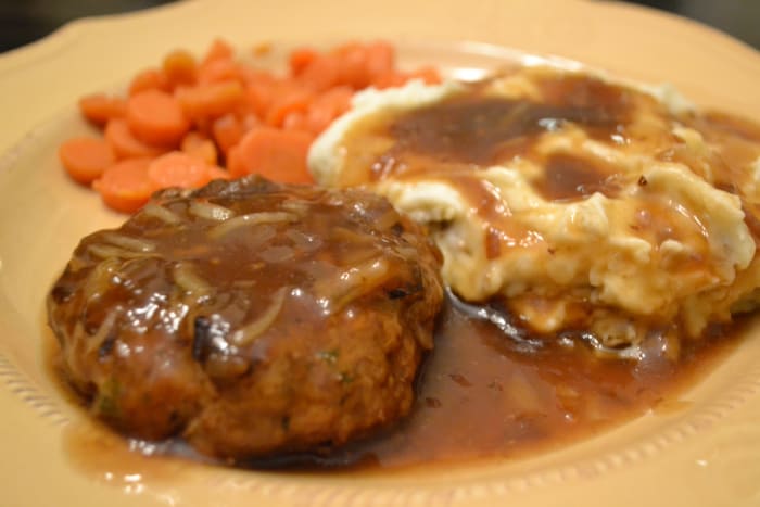 These Salisbury steaks are tender, moist and juicy, especially when smothered and simmered in onion gravy.