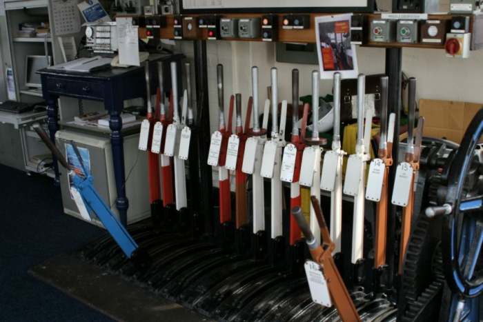Lever frame with gate wheel (right) and modern instruments, Nunthorpe (original instruments were positioned on a shelf above the levers, casings made of wood)