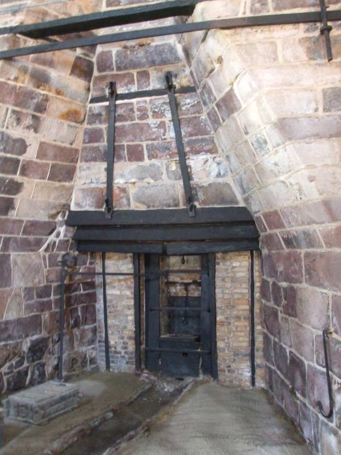 A view of the bottom of the Cornwall furnace with a trough in the sand floor for the molten iron.