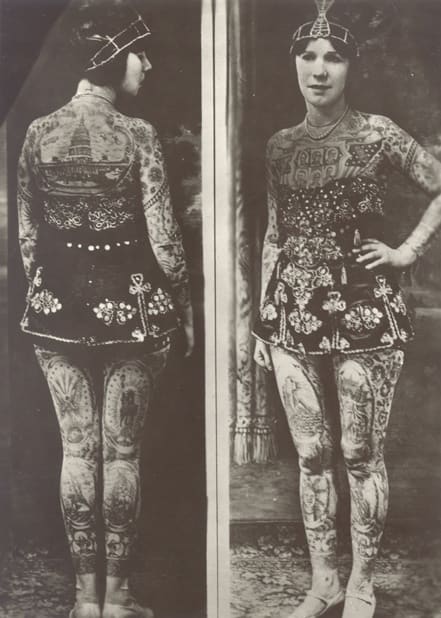 Lady Viola (originally born as Ethel Martin) Covington, Kentucky, 1898; tattooed by Frank Graf (Coney Island) in the 1920s. She became a tattoo attraction, billed as "the most beautiful tattooed woman in the world"; she wasn't only a circus tattooed