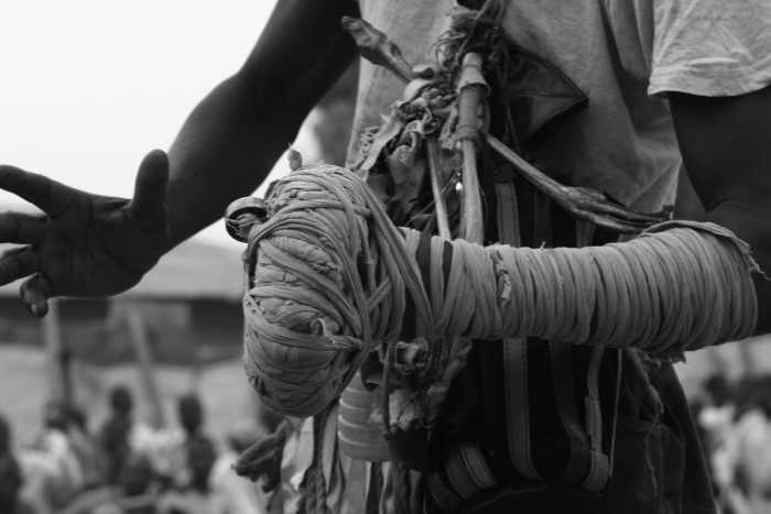 Boxers fist wrapped in cloth. regular boxing gloves are also used in modern Dambe boxing