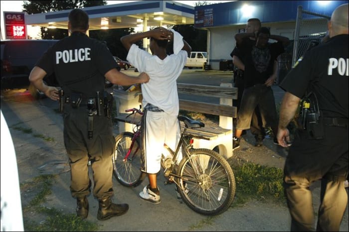 Both African-Americans and white people as well as other races are often stopped by the police to find out what they are doing.