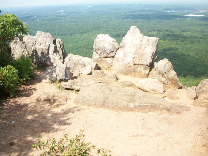 View from the King's Pinnacle. You must hike The Pinnacle Trail to get to this point. You must also climb a few big boulders to get to this view. Photos are provided below.