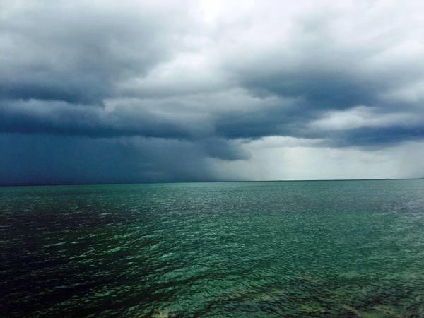 We were sitting on the beach at our Campground when this storm ran up the Gulf waters about 3-4 miles away. It showed up, passed by us and was gone within 30 minutes.