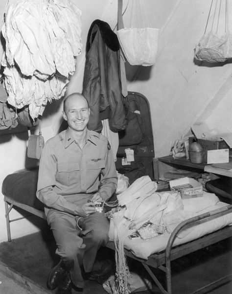 1st Lt. Gail Halvorsen (b. Oct 10, 1920) rigging parachutes for candy drops over Berlin during the Berlin Airlift (circa 1948).